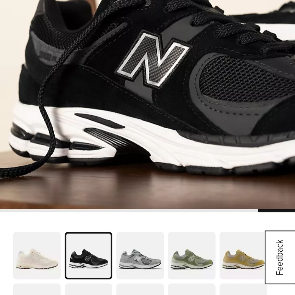 New Balance Black and White Athletic Shoes